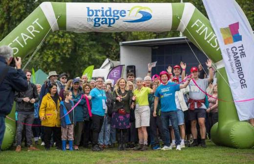 A large group of people at the start line of Bridge the Gap