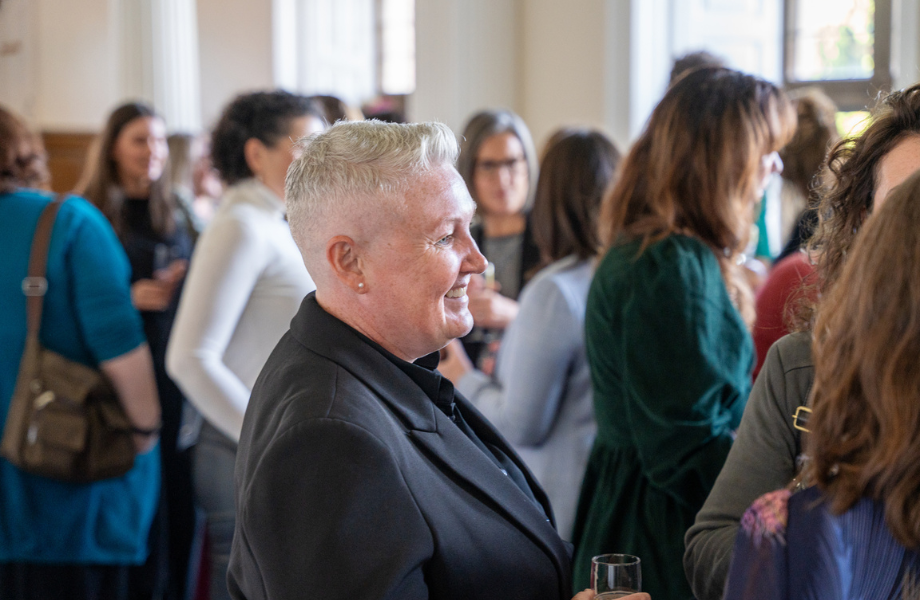Crowd of women standing and networking