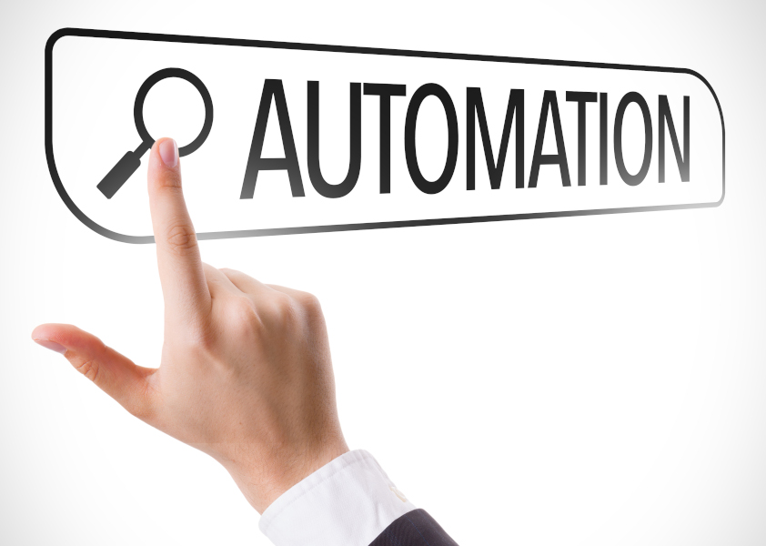 Finger pointing to a screen search bar with the word automation written there
