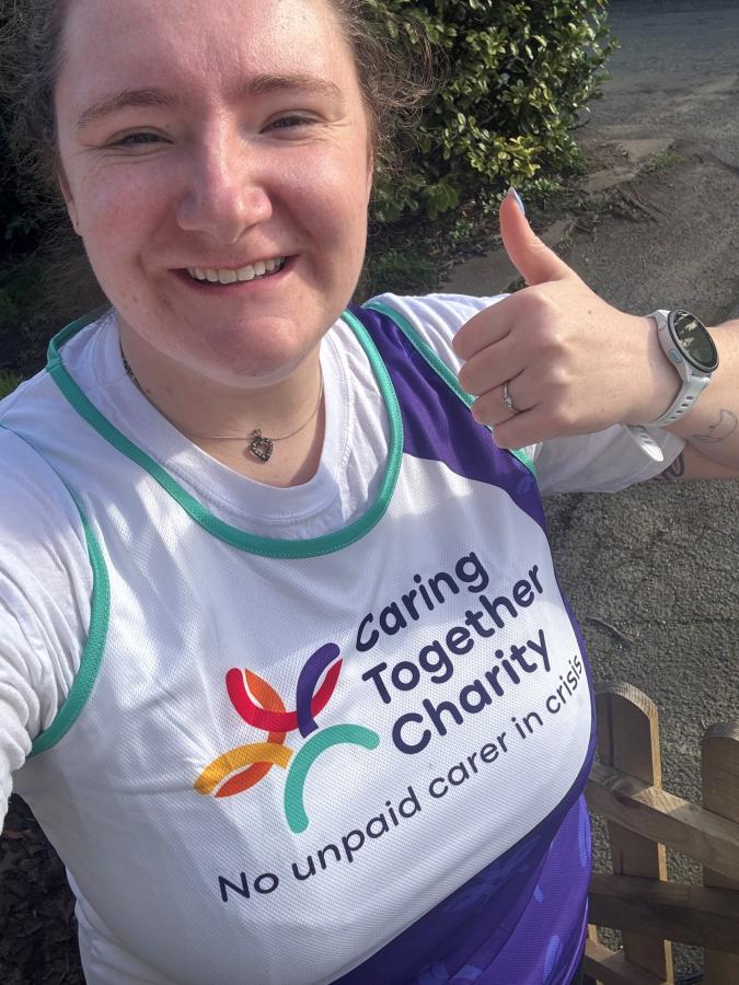 Alice in her Caring Together Charity vest, getting ready to run