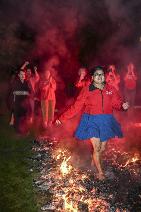 Woman completing firewalk