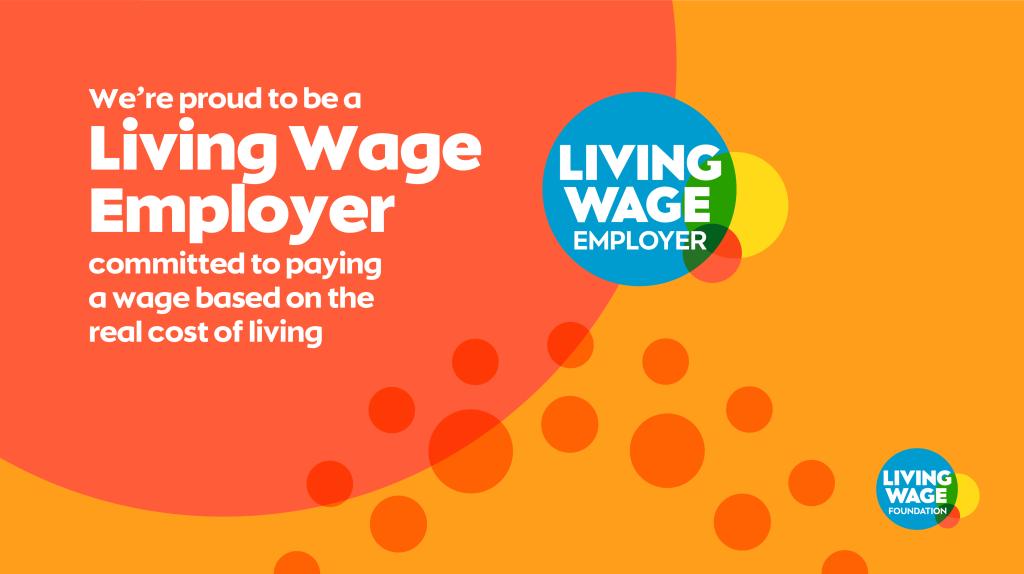 Graphic reads we're proud to be a living wage employer committed to paying a wage based on the real cost of living