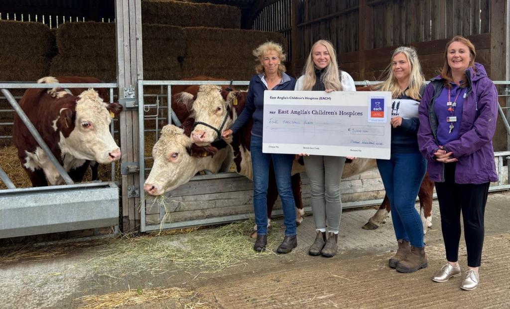 EACH Senior Community Fundraiser Victoria Goldsmith (right) receives a cheque from Pymoor Stockmans Club