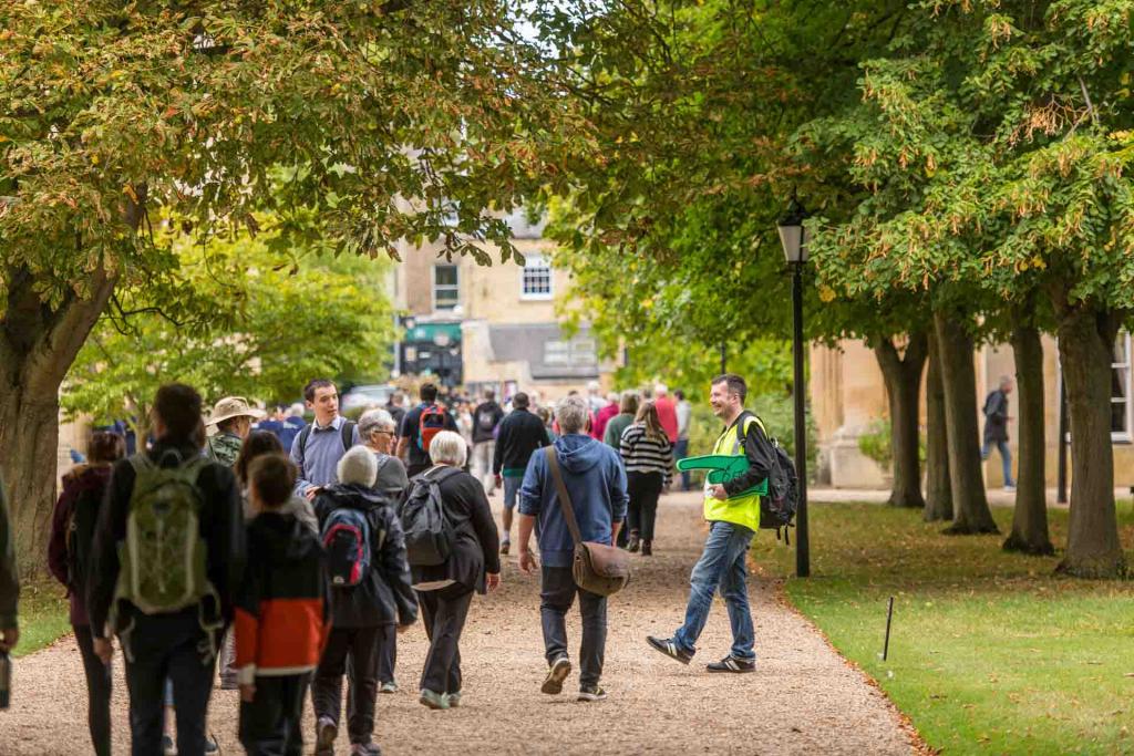 Supporters walking in Cambridge colleges