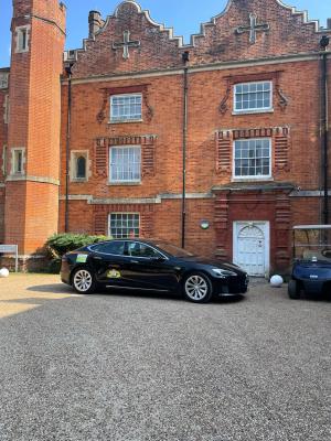 Electric Tesla Model S airport transfer as an alternative to Cambridge airport parking
