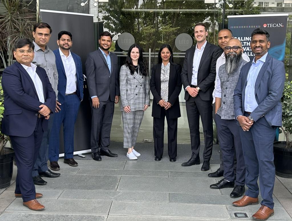 Mukta Acharya, EVP and Head of Tecan's Life Science Business, celebrates the India office opening with HQ and Tecan India team members