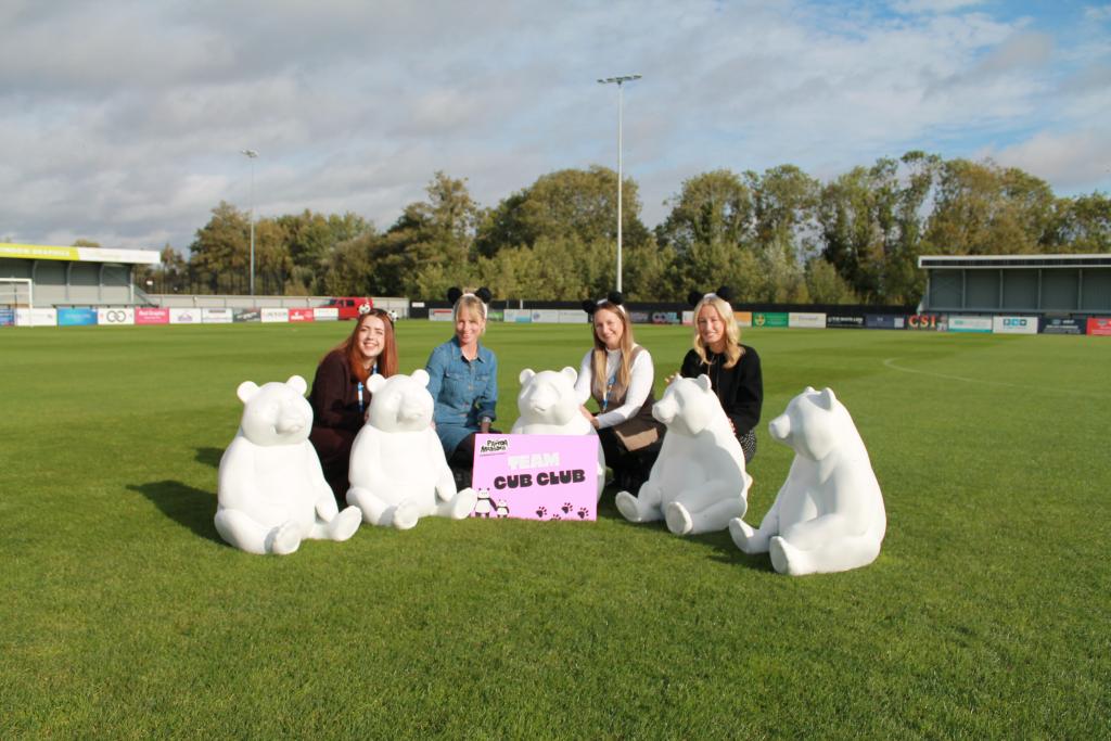 The ACT team with the panda cubs
