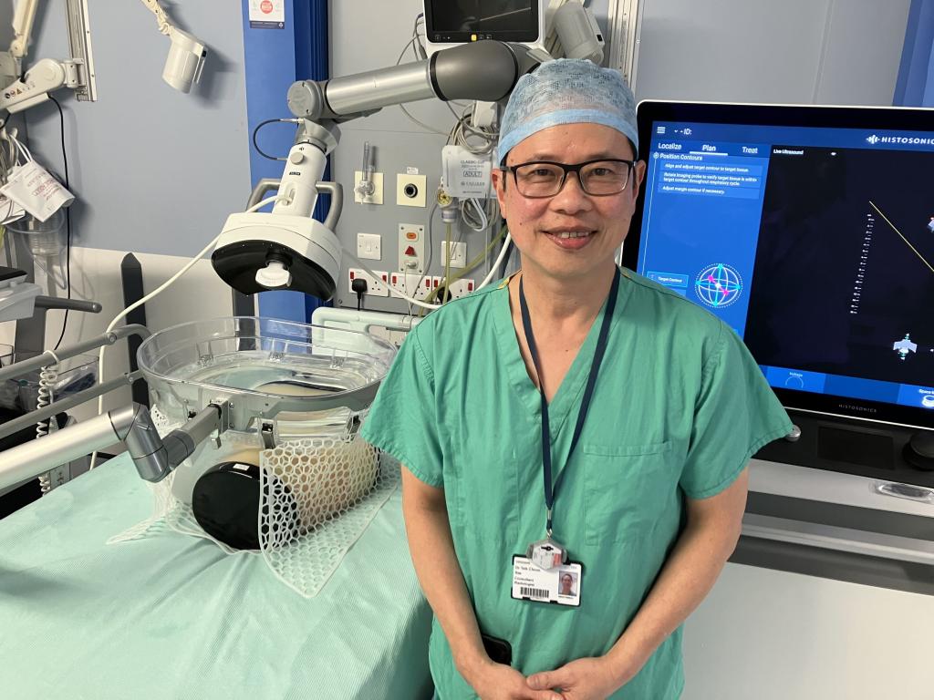 Dr Teik Choon See, consultant interventional radiologist at Addenbrooke’s, in front of the new histotripsy machine
