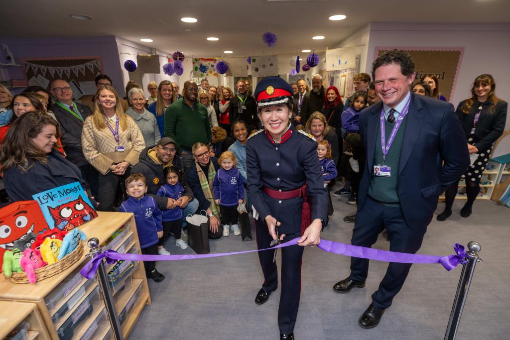 The Deputy Lieutenant of Cambridgeshire, Mrs Jennifer Crompton DL, cuts the ribbon to officially open Kimbolton Pre-School.