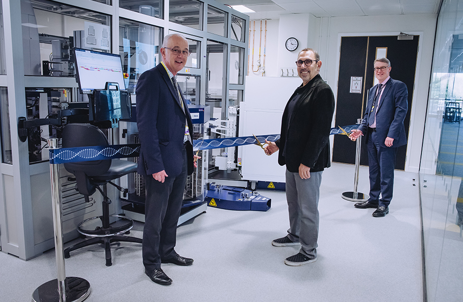 Steve Rees, Tony Kouzarides and Patrick Chinnery cutting a ribbon to launch a new laboratory. 