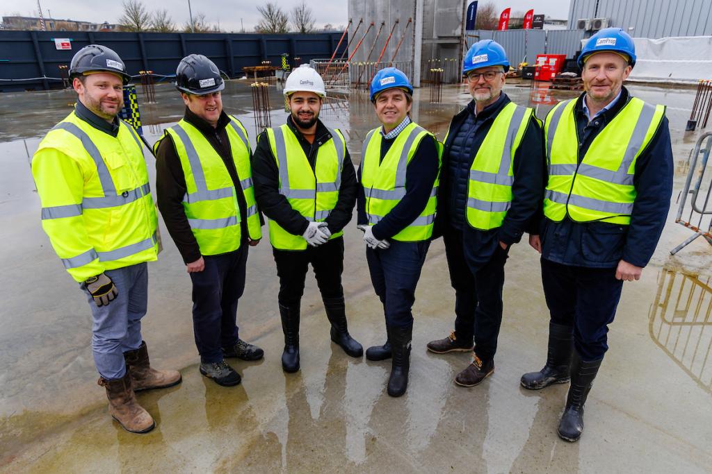 CamProp team with the Mayor, pictured from left Jon Wynne (Senior Project Manager), Chris Wall (Construction Director) Omar, apprentice,  Mayor Dr Nik Johnson, Simon Gusterson (Development Director) and Pat Fitzgerald (Commercial Director).
