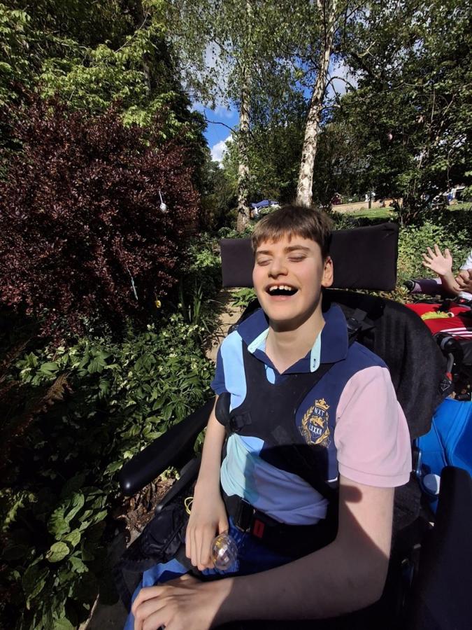 young boy in a wheelchair