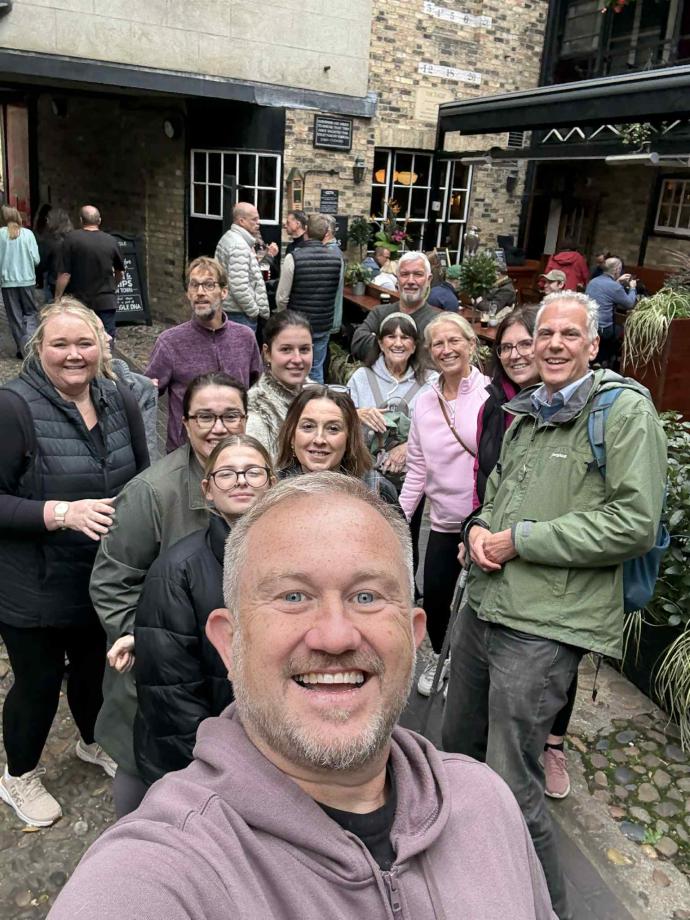 A scene showing an engaged and enthusiastic group on the walking tour