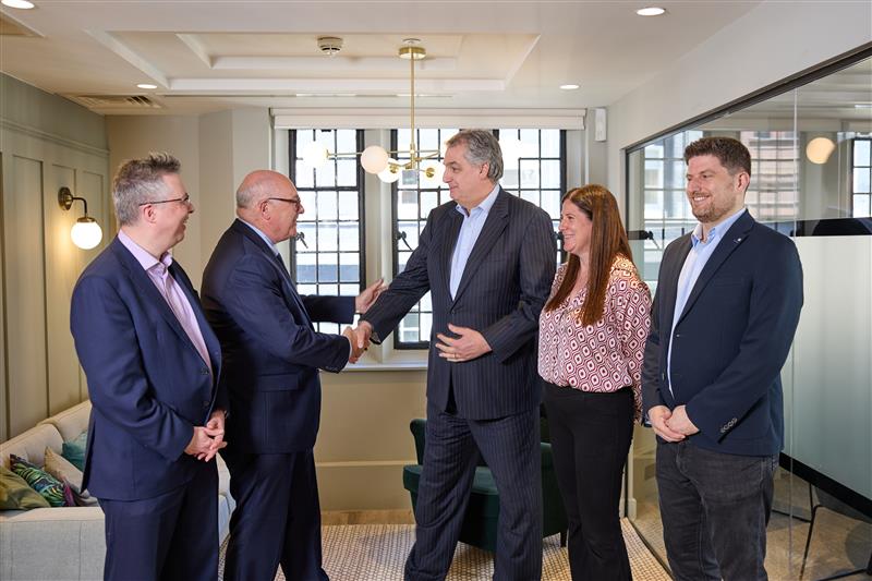 Steven Davidson and Martin Clapson shake hands, as Price Bailey's Mayfair office