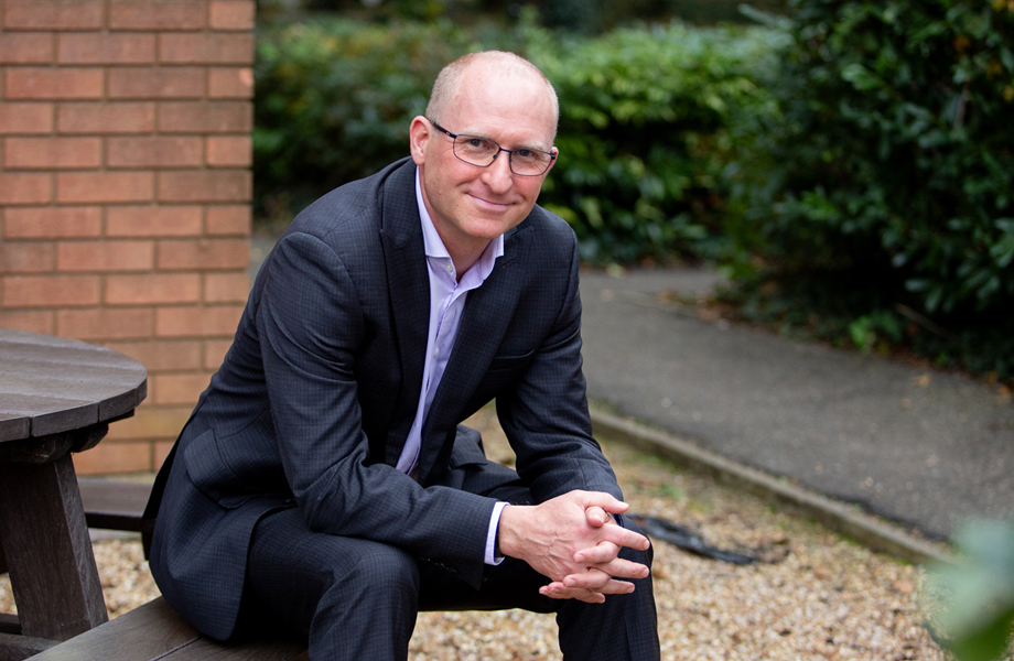 Peter Brown, chief commercial officer at 42 Technology sitting on a bench.