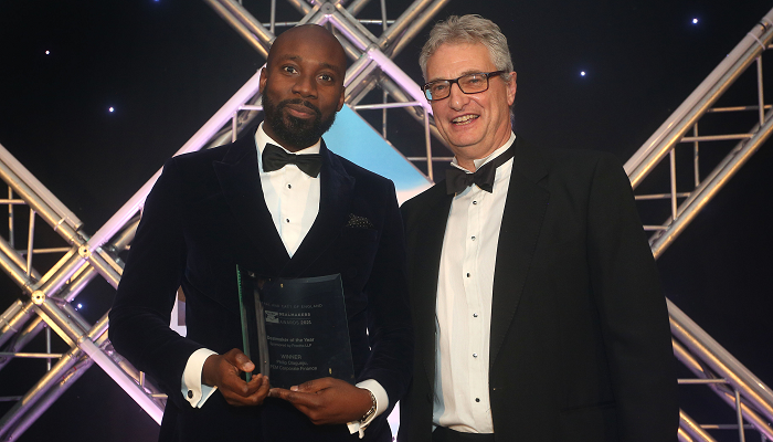 Philip Olagunju, PEM Corporate Finance, receiving an award