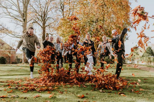 The Sandon Manor team kicking leaves