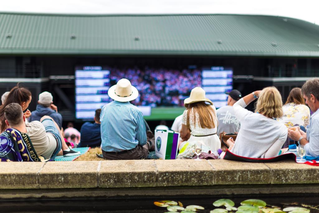 Guests sit outside at Wimbledon 