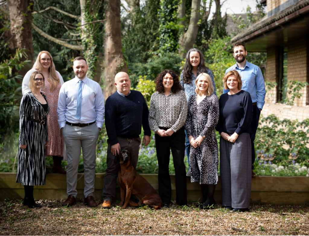 A photo of the Henson Crisp team