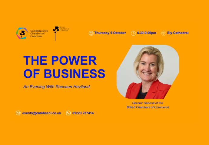 Promotional poster for the Cambridgeshire Chambers of Commerce event titled The Power of Business: An Evening With Shevaun Haviland. The poster has an orange background with blue text. On the right, there is a photo of Shevaun Haviland, smiling and wearing a red blazer. She is identified as the Director General of the British Chambers of Commerce.  Event details are displayed across the top:  Date: Thursday 9 October  Time: 6.30–9.00pm  Location: Ely Cathedral  At the bottom, contact details are shown:  Ema