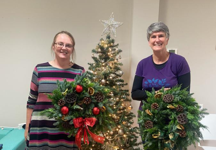 The charity holds festive events like wreath-making for local families 