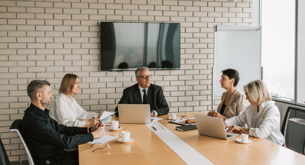 A business meeting taking place in a meeting room