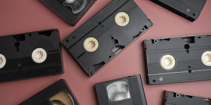 Assorted VHS tapes representing archived legacy video media