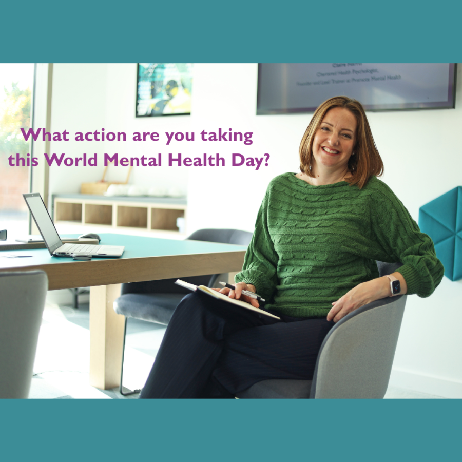 Claire Harris from Promote Mental Health sat at a desk
