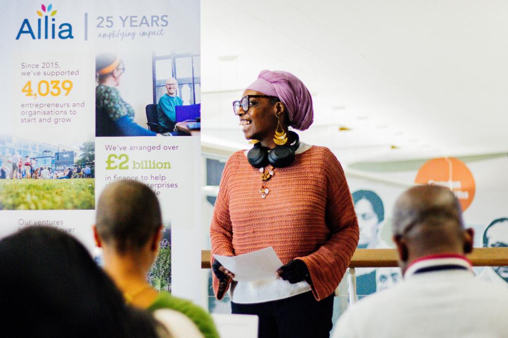 An entrepreneur pitching to a group as part of a Start Strong event.