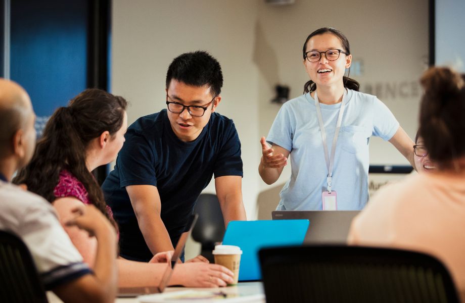 Scientists collaborating to create a scientific sales strategy