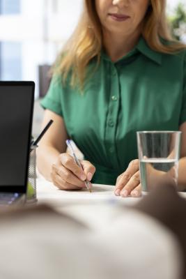 applicant filling an application form and a assessment