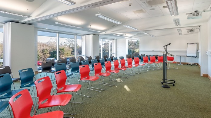 The Education & Conference Centre at Arthur Rank Hospice Charity set up as a Conference Room with a maximum capacity of 90 people. The room can also be divided into two or three smaller spaces. 