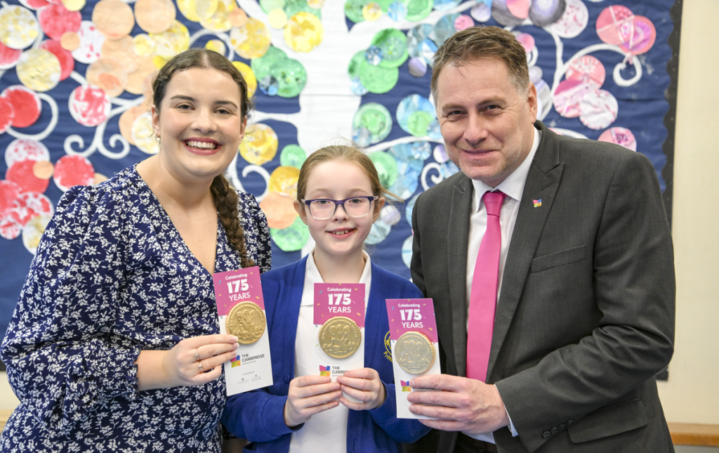 Vaughan and Joanne, Customer Engagement Team Members from The Cambridge, visited Exning Primary School on Tuesday to present Erica with her delicious coin and then helped her deliver the coins to every class, where Erica was greeted with smiles, cheers and applause from her peers