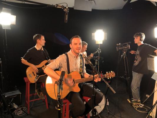 Students filming a music performance at Cambridge TV