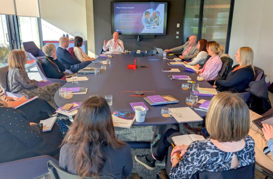 A Cambridge Network peer group: attendees seated around a boardroom table.