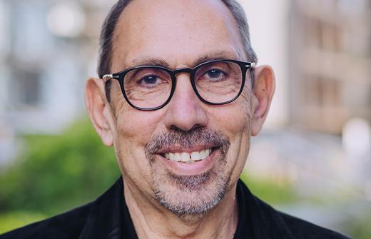Headshot of Sir Tony Kouzarides