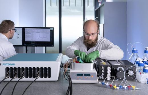An engineer working on a medical device and ensuring regulatory compliance