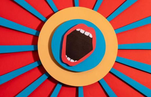 An open mouth illustration in a blue circle, a yellow circle is around the blue circle and is surrounded by blue stripes on a red background