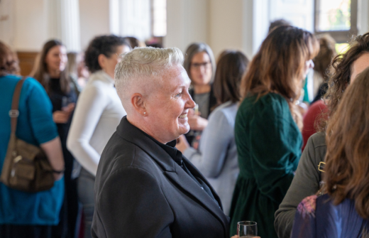 Crowd of women standing and networking