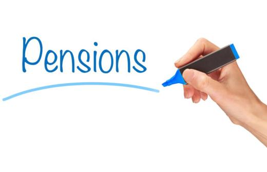 Hand holding pen, having inscribed and underlined the word Pensions in blue, on a white background 