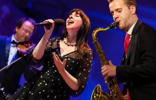 Jazz musicians playing music and singing