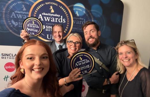 The ACT team accept their Charity of the Year award