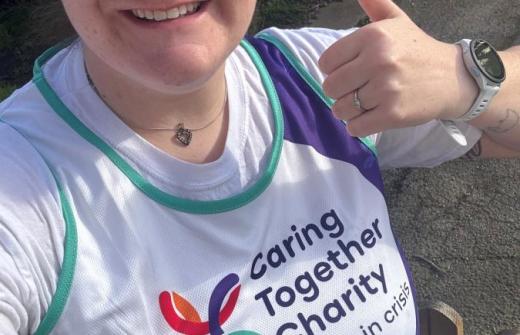 Alice in her Caring Together Charity vest, getting ready to run