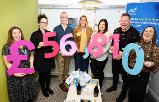 Cambridge Commodities staff celebrate their impressive fundraising total with ACT