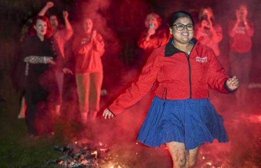 Woman completing firewalk