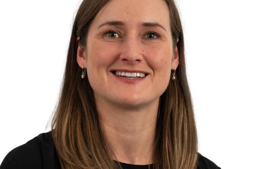 Headshot of Charlotte Macdonald with a white background.