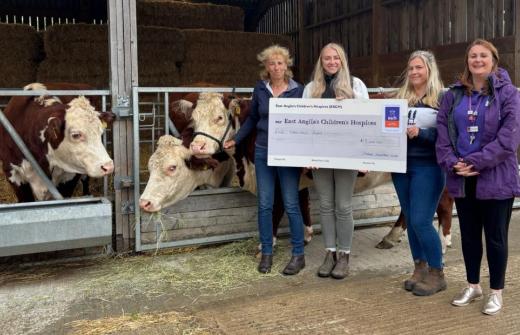EACH Senior Community Fundraiser Victoria Goldsmith (right) receives a cheque from Pymoor Stockmans Club