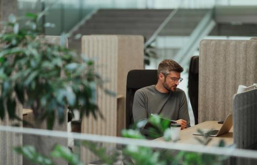 Man sat at office desk
