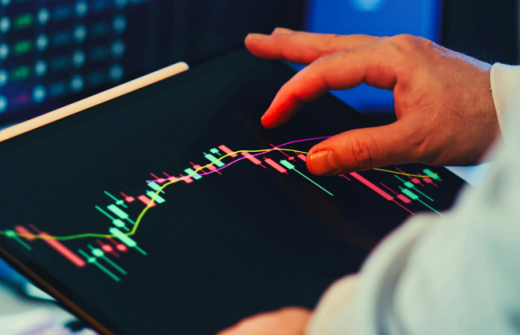 a man looking at investment markets