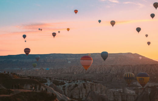 Hot air balloons in the sky at sunset